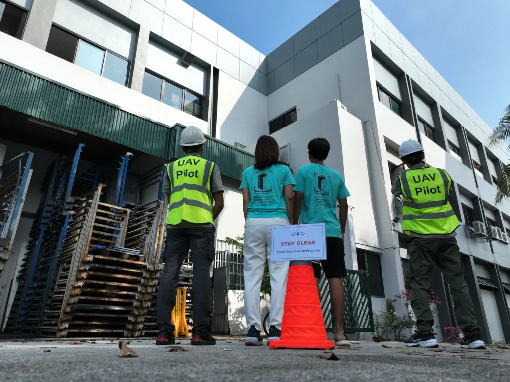 Competent Person and drone operators carrying out ground level facade observation
